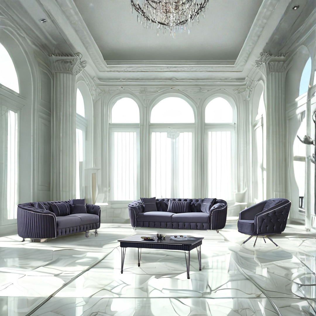 Luxury dark velvet sofas and coffee table in a bright, modern white marble living room.