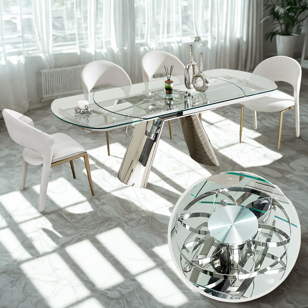 Modern luxury glass dining table with white chairs in a bright contemporary dining room.