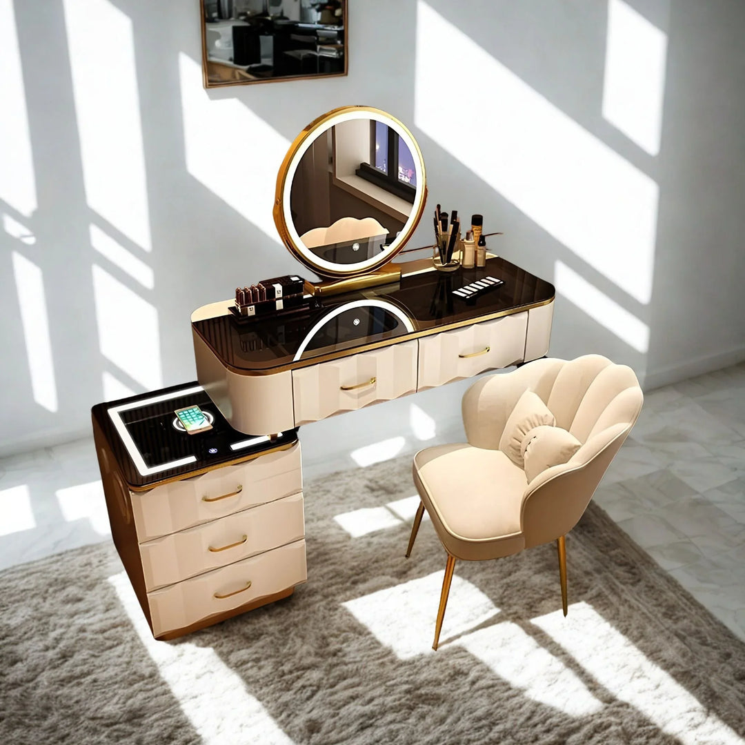 Luxury cream and gold vanity dressing table with illuminated round mirror and velvet chair.