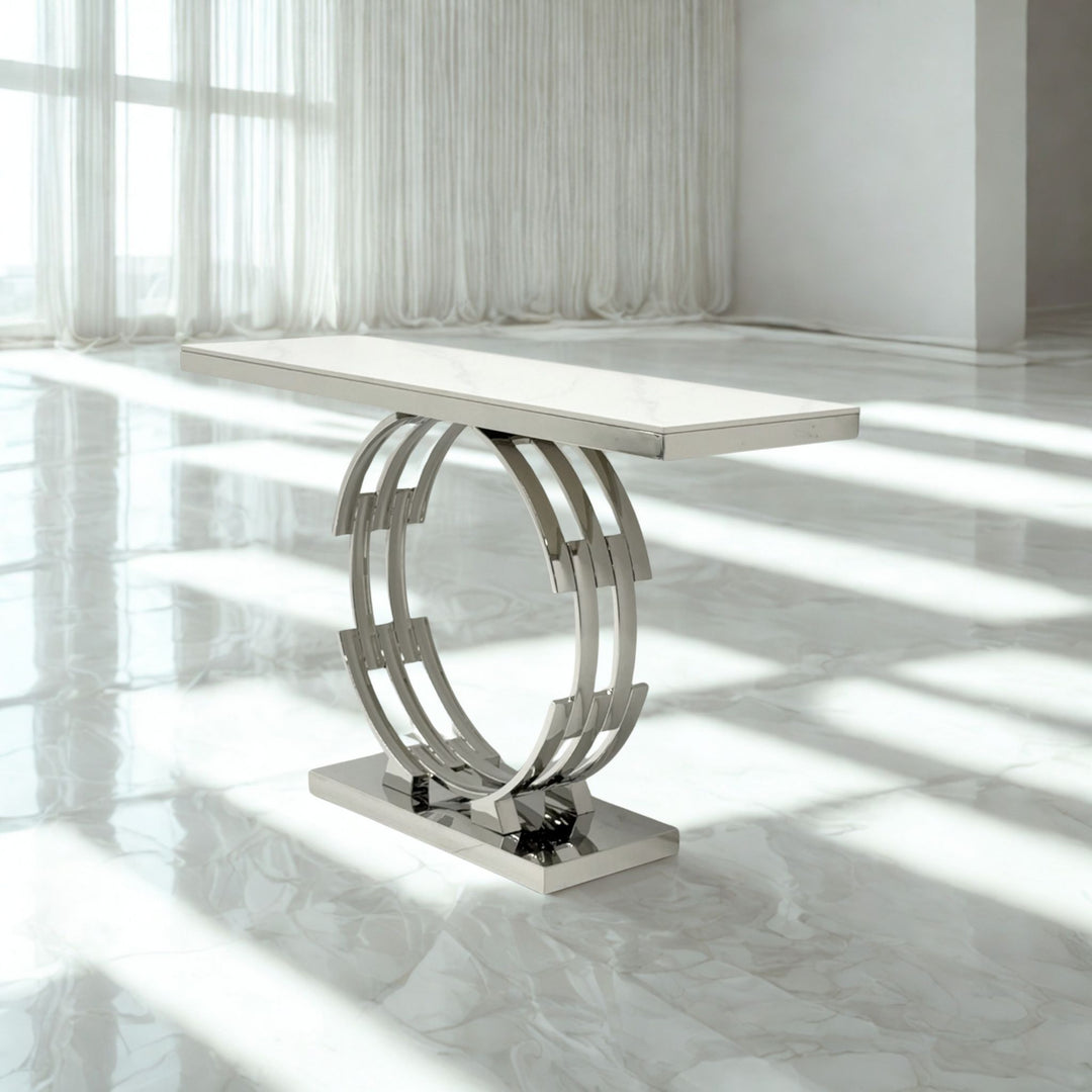 Cirena sculptural console table with white rectangular top and polished silver circular pedestal base