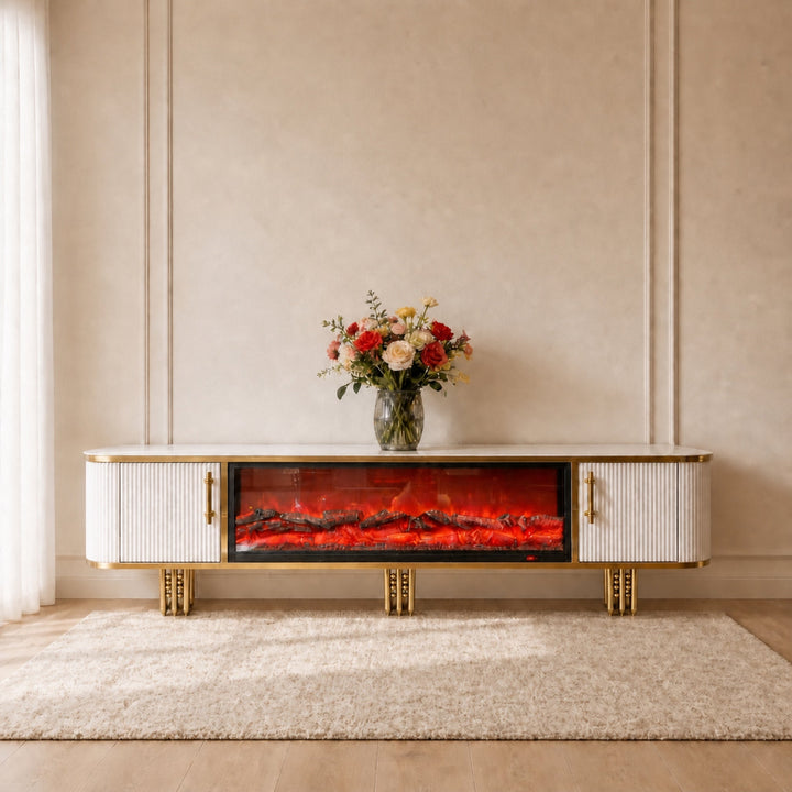 White and gold Liora Fireplace TV Unit with fluted doors and decorative gold legs, front view
