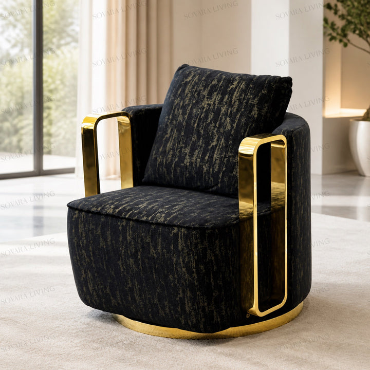 Black accent chair with rectangular mirror-gold arm frames in a warm neutral living room