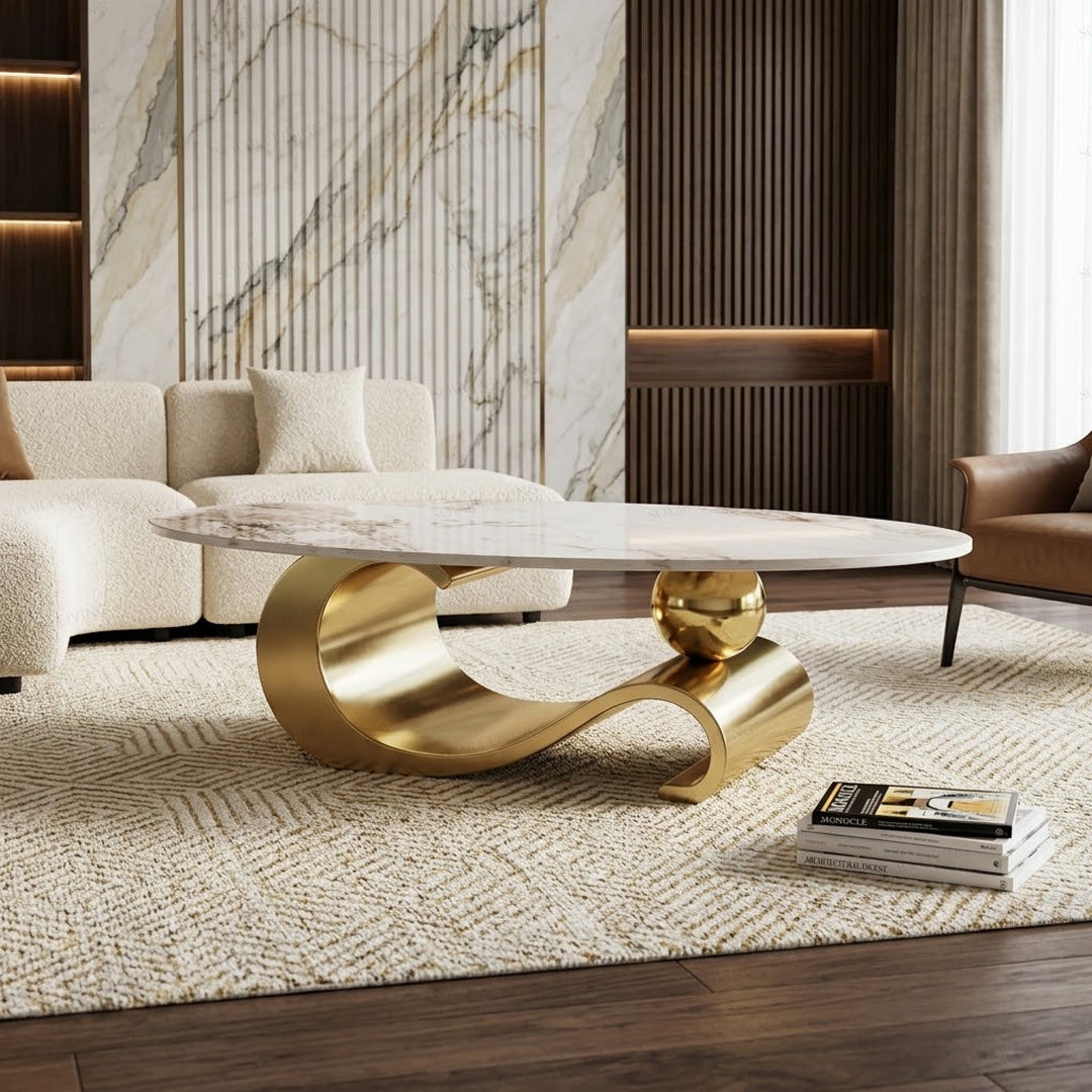 Orbita luxury coffee table with sculptural mirror-gold base and light-toned top