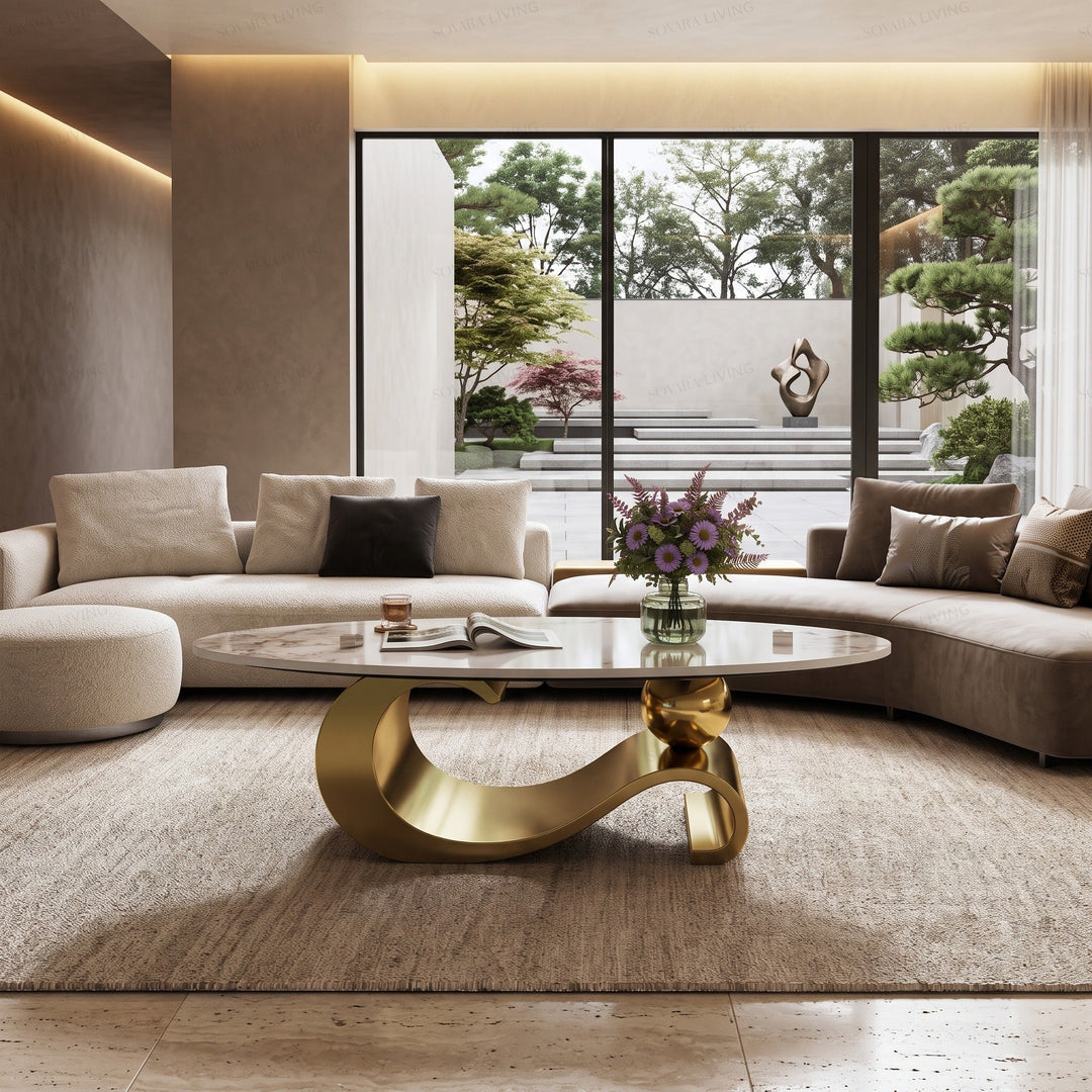 Orbita sculptural gold coffee table in a luxury living room