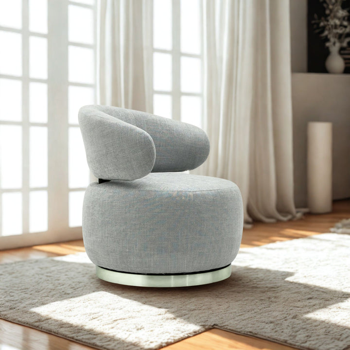 Virella swivel accent chair in grey fabric with brushed gold base - profile view